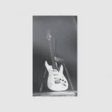 DORTI black and white electric guitar on a stand against a dark background