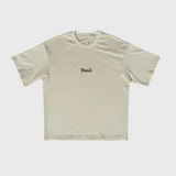 Beige DORTI t-shirt with 'Dorti' logo on a white background