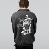 Person wearing a black DORTI jacket with a Jimi Skull graphic design on the back, featuring a stylized illustration of a Jimi Skull playing guitar..
