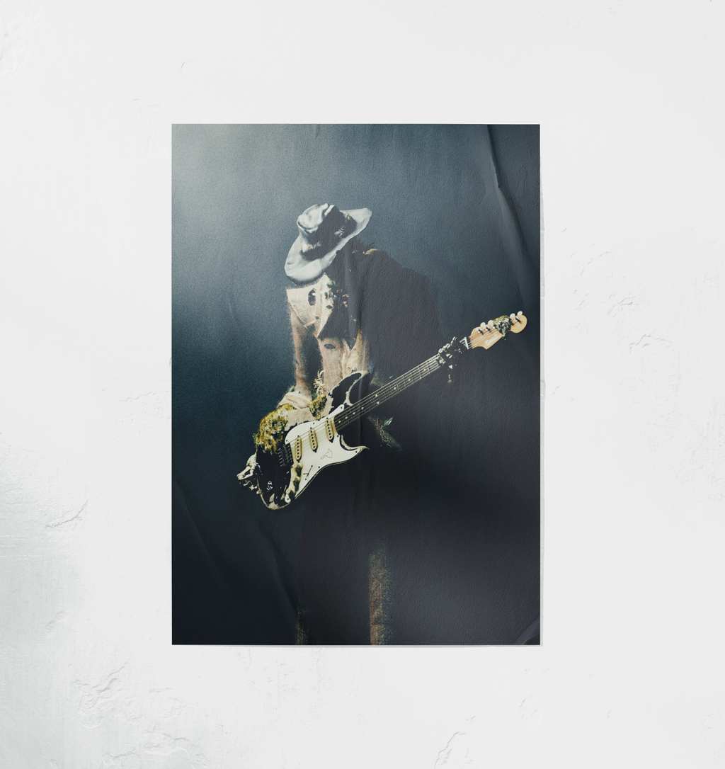 DORTI poster of a Jimi Skull playing guitar with a hat on a dark background