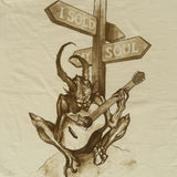 Illustration of a demon-like creature playing a guitar with 'I Sold My Soul' signpost on beige background. DORTI T-Shirt.