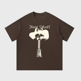 Brown DORTI t-shirt with white graphic design and 'Jimi Skull' text on a white background