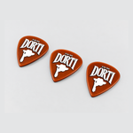 Three DORTI 0.96mm nylon guitar picks at an angle, showing the orange finish