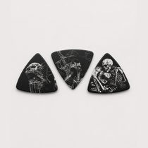 DORTI Boneyard Collection variety pack: three black triangle Delrin guitar picks with skeleton art