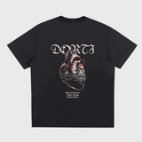 Black t-shirt with graphic design and text on a white background