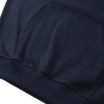 Close-up of a navy blue DORTI fabric texture on a white background