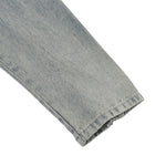 Close-up of a folded DORTI denim sleeve on a white background